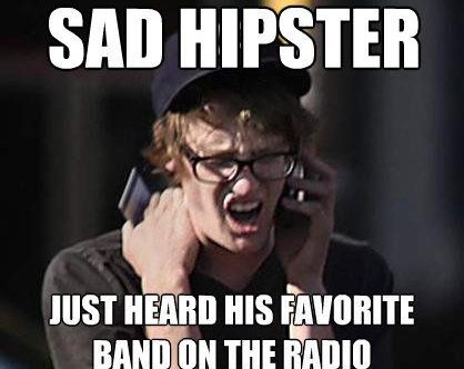 SAD HIPSTER JUST HEARD HIS FAVORITE BAND ON THE RADIO