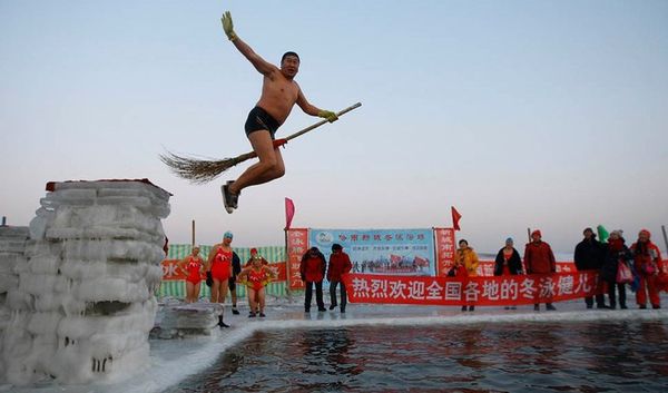 chinese guy on a broom