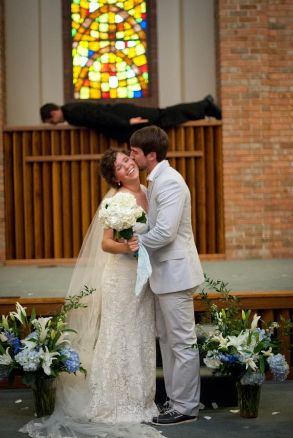 wedding photo planking priest