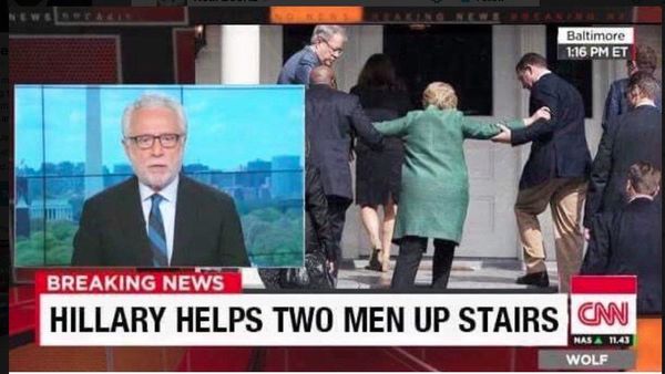 BREAKING NEWS HILLARY HELPS TWO MEN UP STAIRS